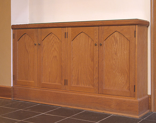 oak storage cabinets in prayer chapel