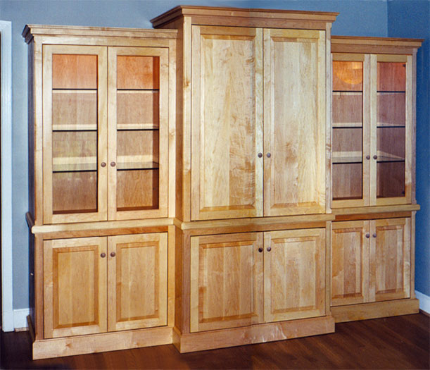 maple media center and dining room display cabinets