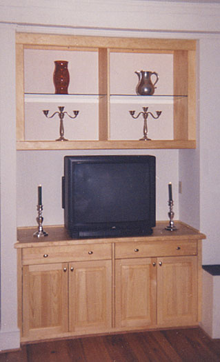 pine media center with glass display shelves